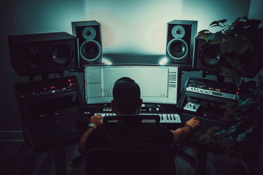 Independent music producer reviewing streaming distribution and royalty platforms