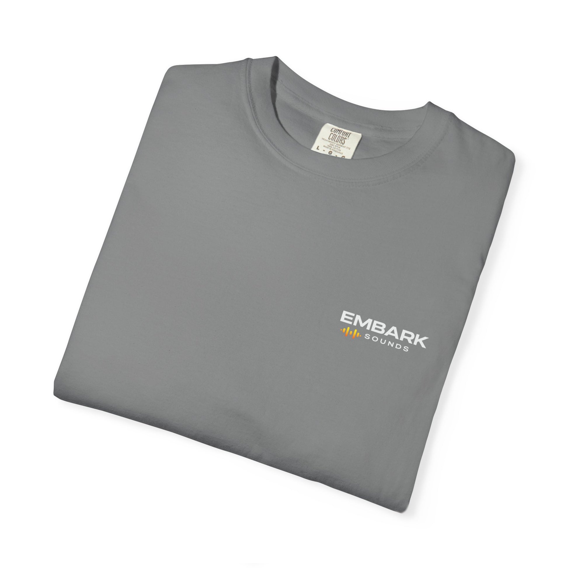 Folded gray t-shirt with a small logo on a white background