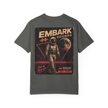 Gray t-shirt with an astronaut graphic and 'Embark Sounds' text on a white background