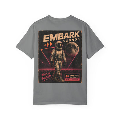 Gray t-shirt with an astronaut graphic and 'Em bark Sounds' text on a white background