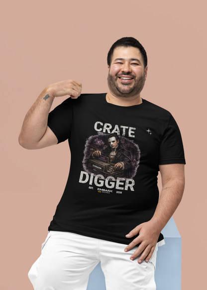 Man wearing a black t-shirt with 'Crate Digger' graphic design on a beige background