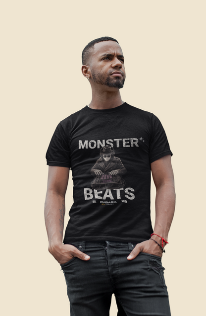Man wearing a black t-shirt with 'Monster Beats' design on a beige background